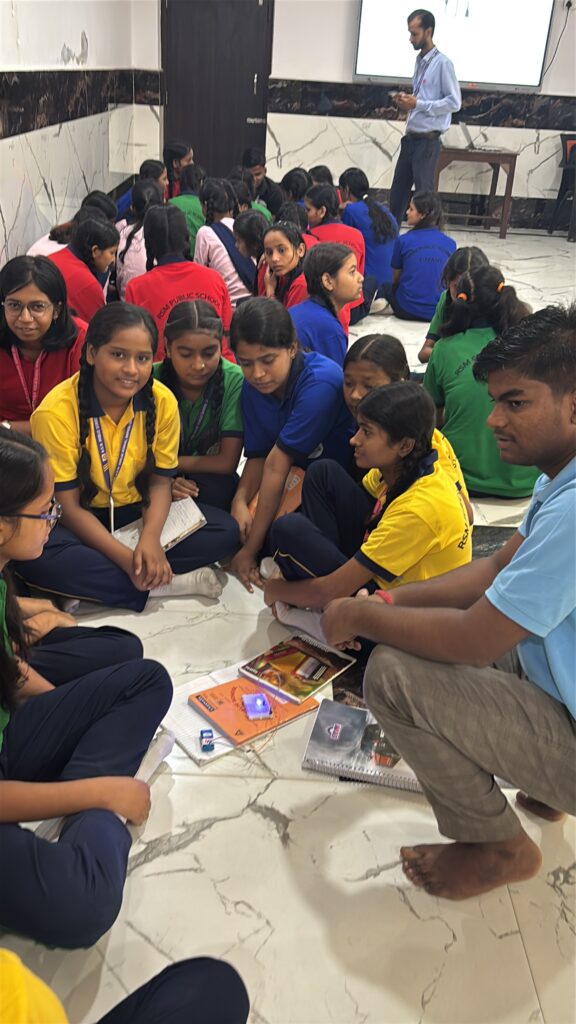 Students light their first LED circuit with a Kod2Kids mentor